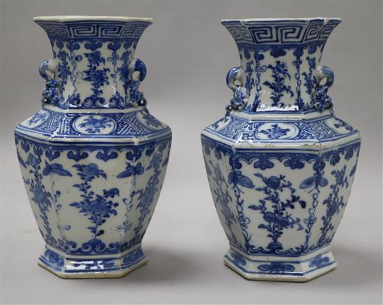 A pair of Chinese blue and white hexagonal vases, 19th century, 20.5cm (a.f.)